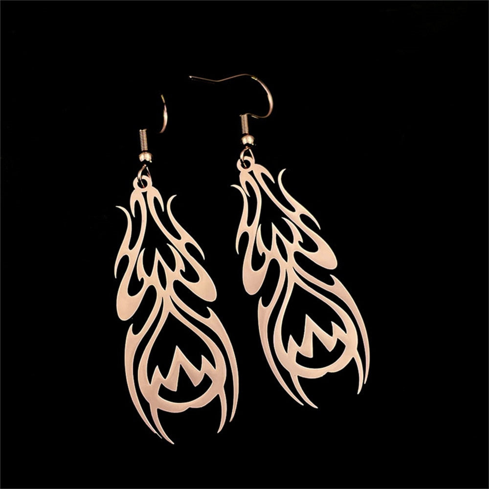 Boucles d’oreilles insectes tribaux abstraits